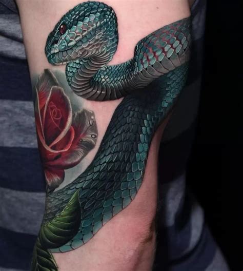 what do snake tattoos symbolize.